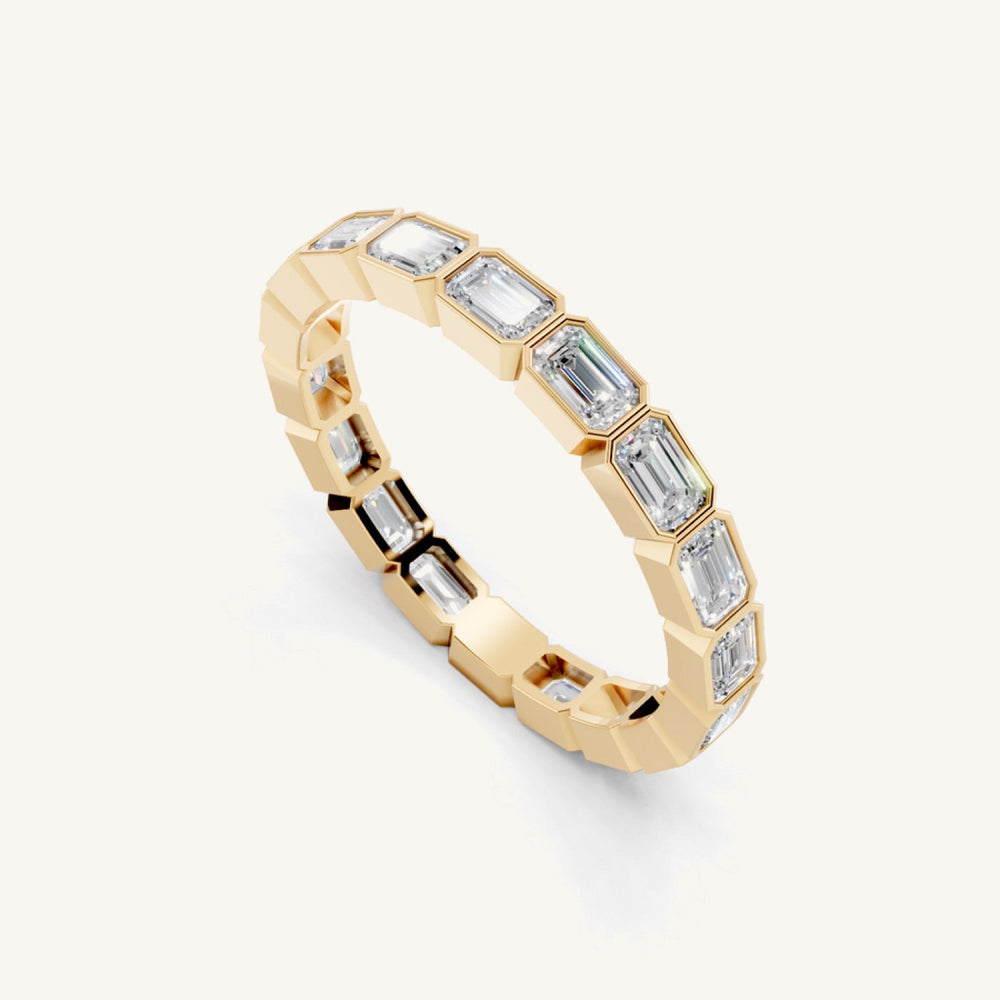 East-West Emerald Bezel Eternity Band